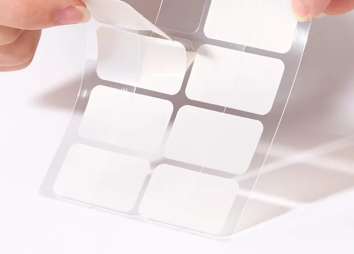 TKTK patches: hand peeling a rounded-rectangle patch